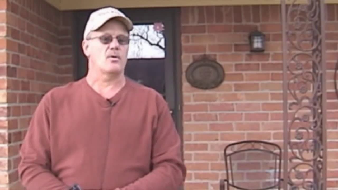 Richard Bartosh in front of a brick home in Deer Park